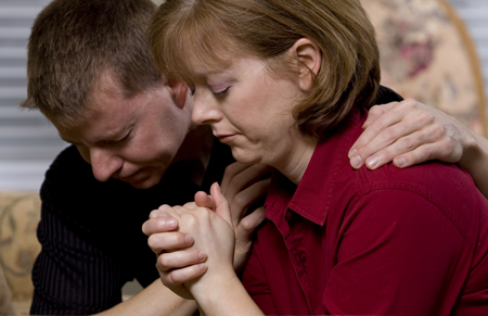 couple praying together