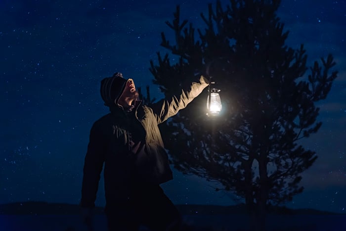 man with lantern