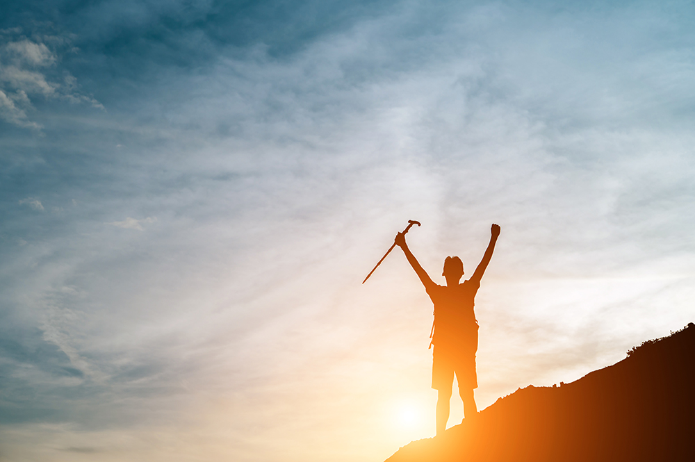 silhouette-on-the-top-of-the-mountain