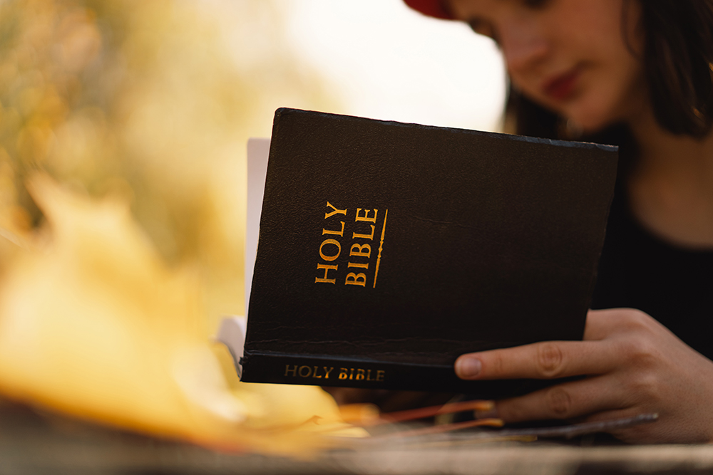 christian-teen-girl-holds-bible