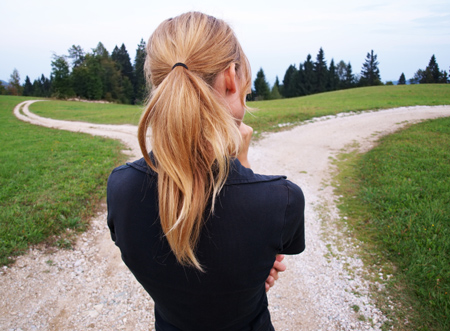 young woman deciding which path to choose