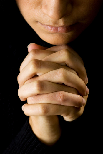 close-up of person praying