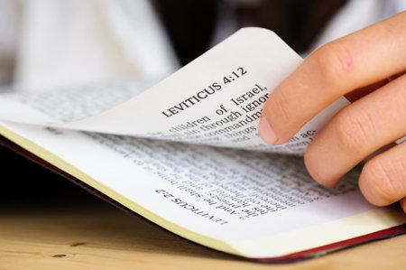 Bible open to Leviticus