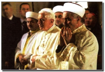 Benedict XVI praying at the Blue Mosque with Mustafa Cagrici, grand mufti of Istanbul