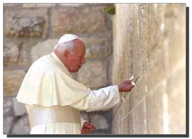 John Paul II, inserting a prayer slip into the Wailing Wall, Jerusalem