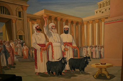priests in courtyard with goats