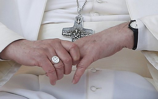 pope's ring and cross