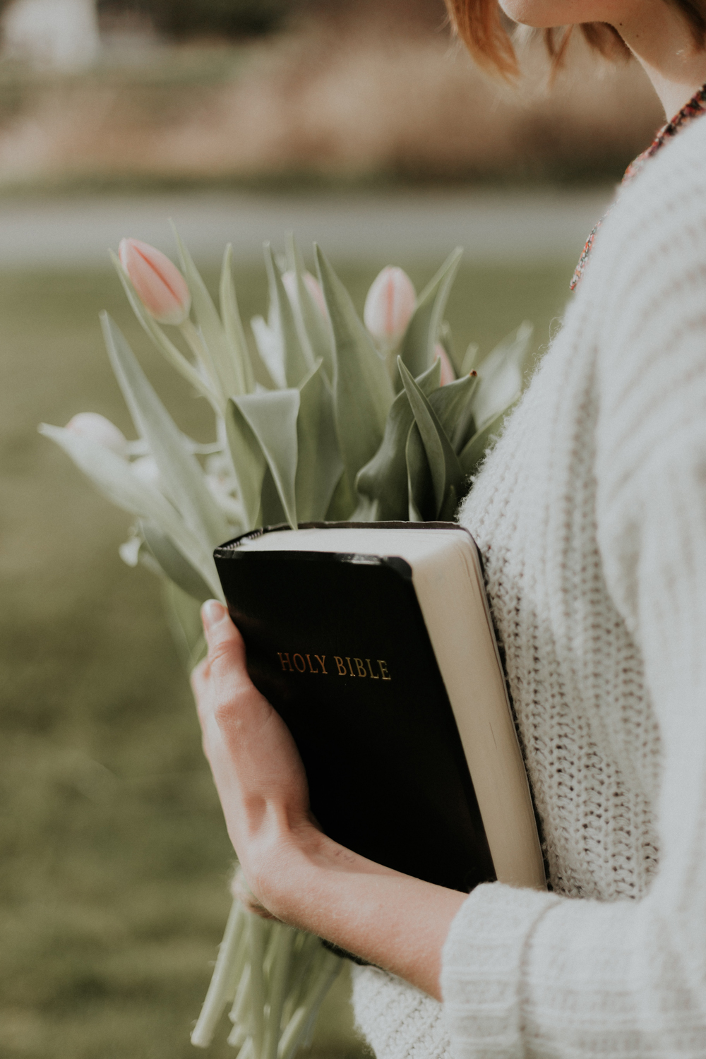 girl with bible and tulips 