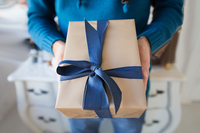 man-holding-gift-box