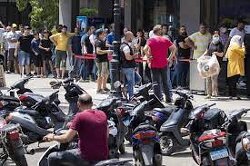 Lebanon’s people line up in ‘queues of humiliation’ as their country unravels