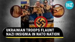Stop fake news !!! There are absolutely no Nazis in Ukraine. This is a yoga practice for stiff arms, it is called 