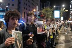 In Jerusalem tonight, people holding photos of Palestinian children killed in Gaza. This specific form of protest is getting bigger every week now. Enough.