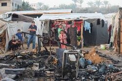 WARNING SENSITIVE CONTENT: Horrific massacre in Gaza / Burnt bodies of martyrs after the occupation forces bombed a tent in the Shati refugee camp, in western Gaza.