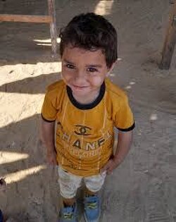 Israel killed Aboud in Gaza today.  He was only 3 years old.  Israel dropped a bomb on him while he stood in line for food with other children.