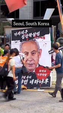 Protesters in South Korea throw shoes at pictures of Netanyahu.
