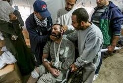 The released Palestinian prisoners came out of Israeli jails in a deplorable health condition, some were carried, while others could barely walk, leaning on their relatives for support.